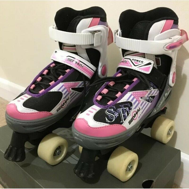 Roller Skates/Boots. Adjustable size Fits UK 1-4