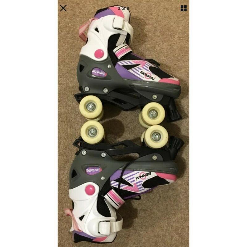 Roller Skates/Boots. Adjustable size Fits UK 1-4