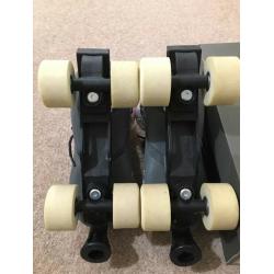 Roller Skates/Boots. Adjustable size Fits UK 1-4