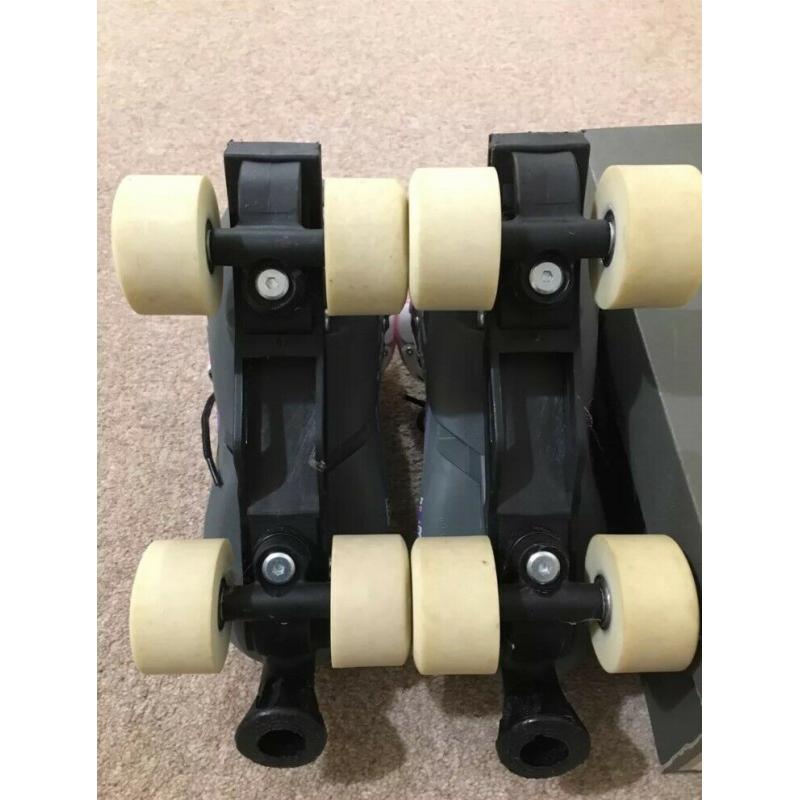 Roller Skates/Boots. Adjustable size Fits UK 1-4