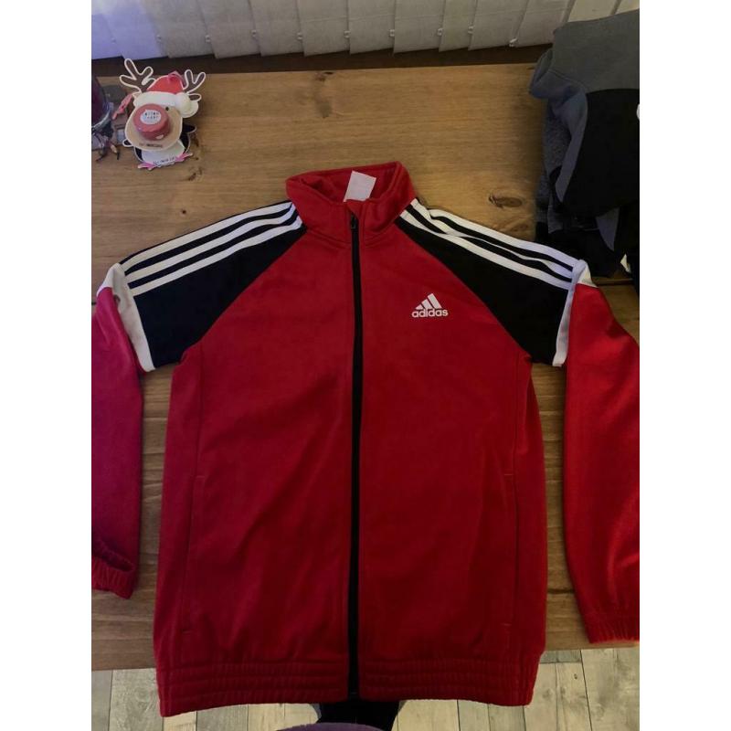 4 age 11-12 zip up tops. (Uk size)