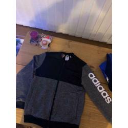 4 age 11-12 zip up tops. (Uk size)