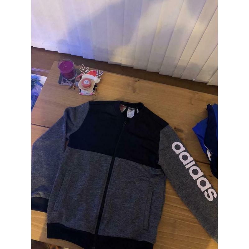 4 age 11-12 zip up tops. (Uk size)