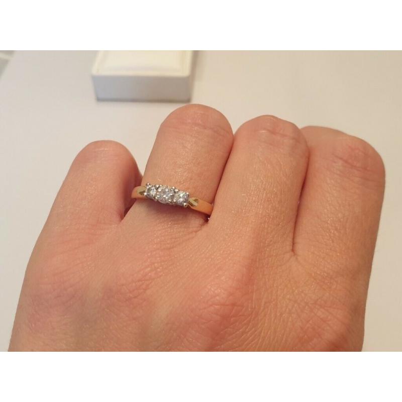 18 carat gold diamond trilogy ring
