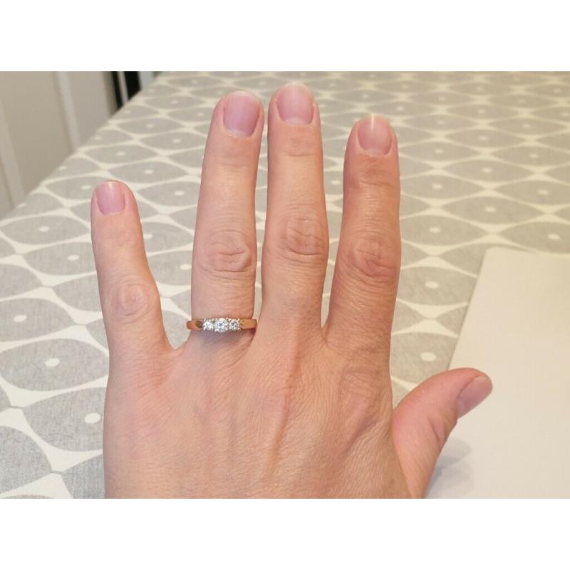 18 carat gold diamond trilogy ring