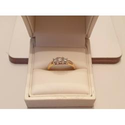 18 carat gold diamond trilogy ring