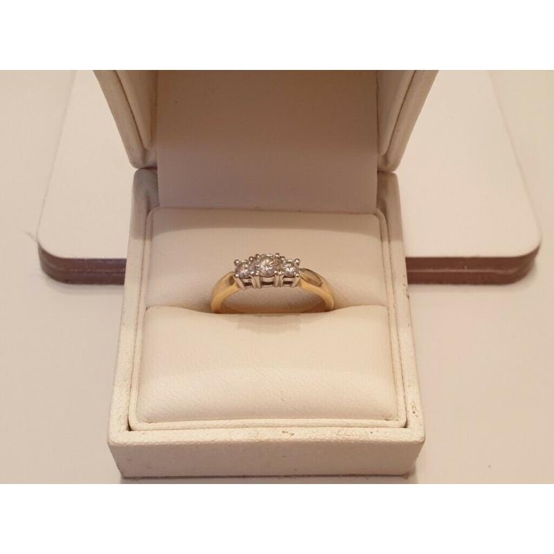 18 carat gold diamond trilogy ring