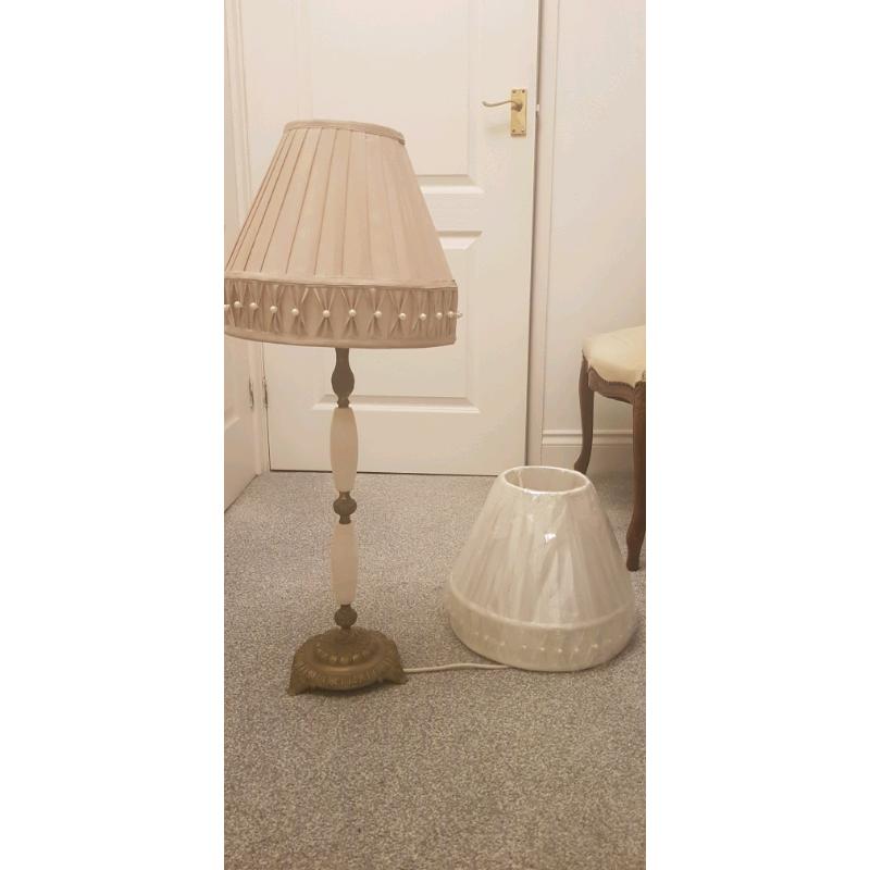 Gorgeous ornate marble and brass tall lamp.