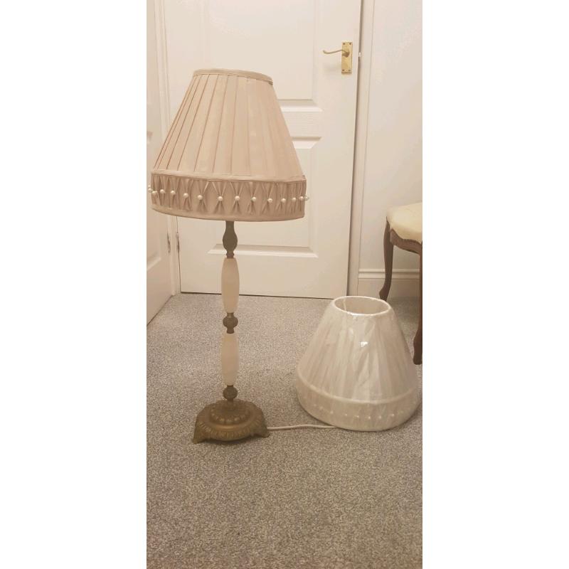 Gorgeous ornate marble and brass tall lamp.