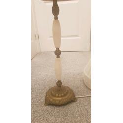 Gorgeous ornate marble and brass tall lamp.