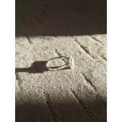 Engagement Ring - 18ct white gold 1/2ct Diamond oval halo cluster