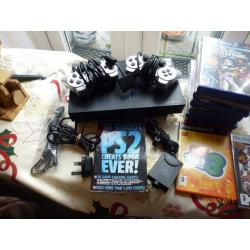 PLAYSTATION 2 BUNDLE CONSOLE & TWO CONTROLLERS& 20 PLAYSTATION 2 GAMES