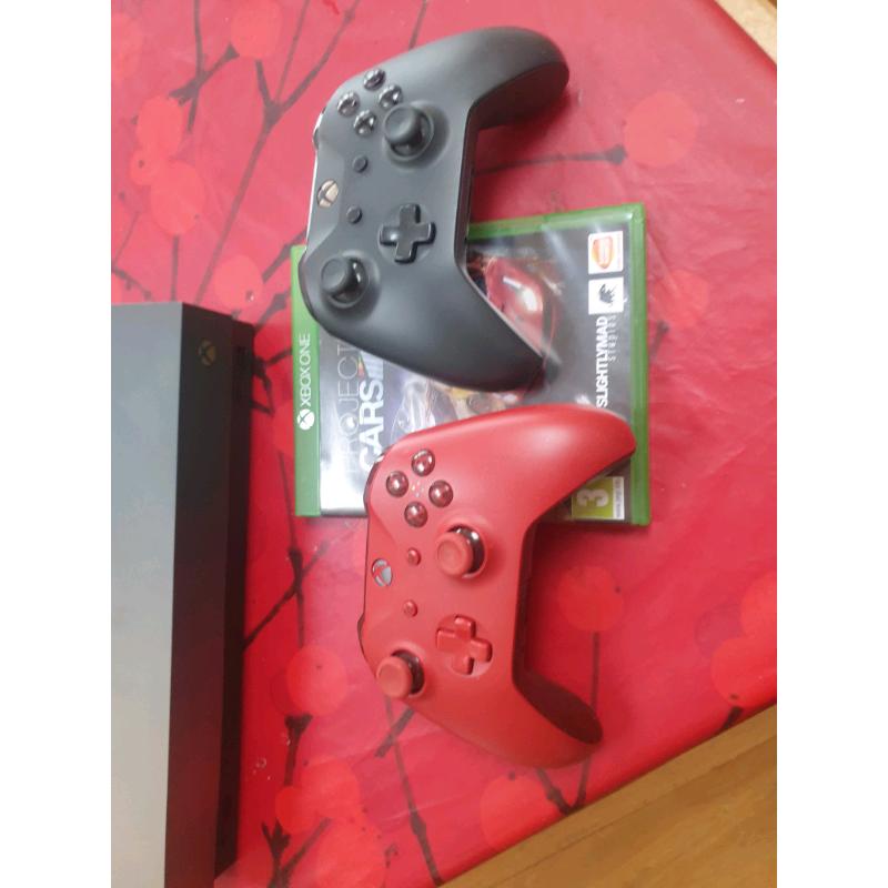 Xbox one x and steering wheel ,racing chair