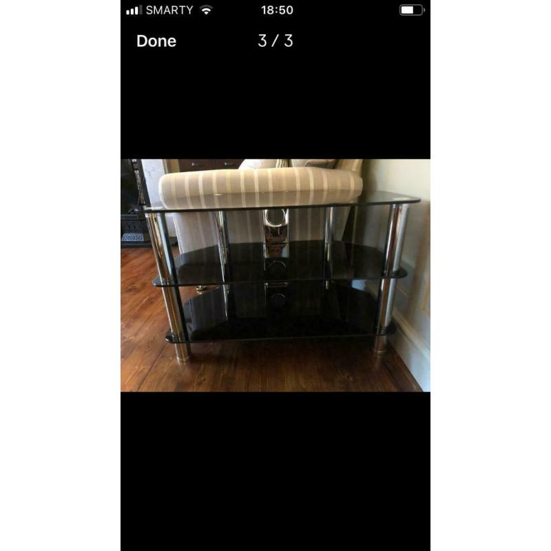 TV stand. As new in Chrome/Smoked Glass.