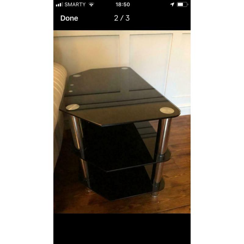 TV stand. As new in Chrome/Smoked Glass.