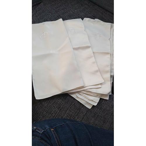 12 Cream Ivory fabric napkins with embroidered flower on corner