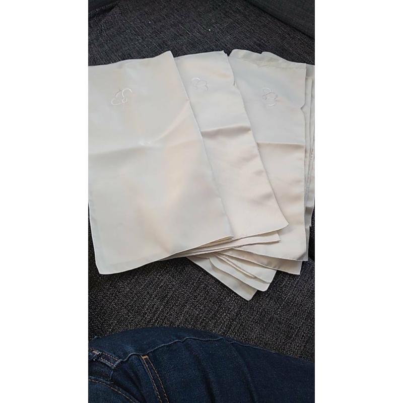 12 Cream Ivory fabric napkins with embroidered flower on corner