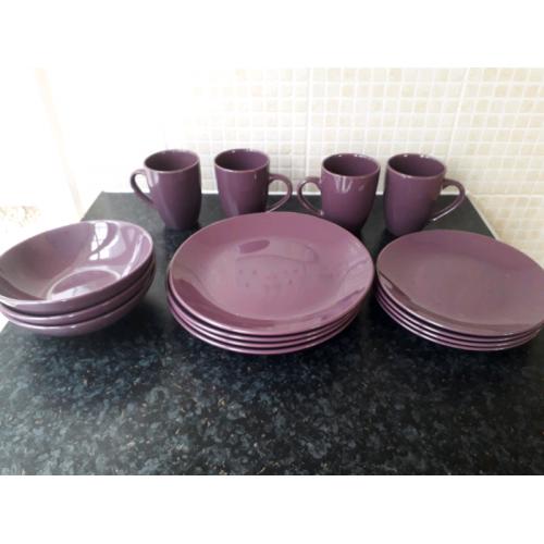 Set of purple matching plates and bowls
