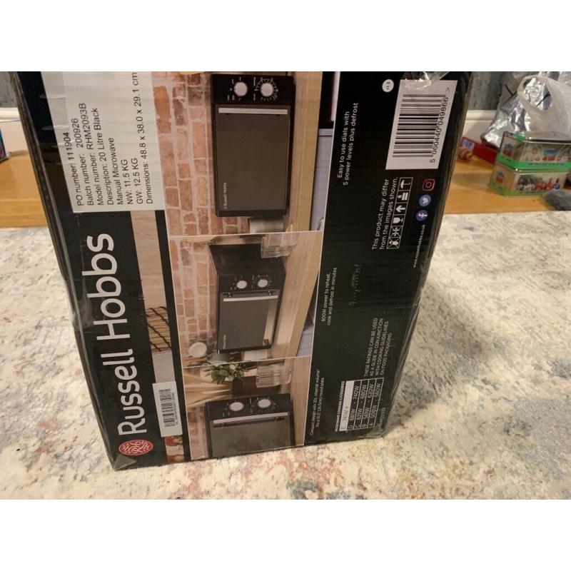Brand new in box Russell Hobbs compact microwave