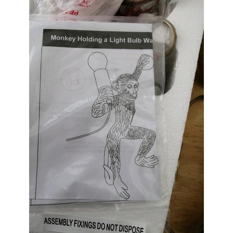 Monkey wall light